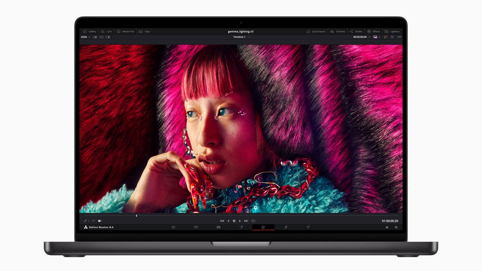 14 inch MacBook Pro screen showing a colour grade being applied in DaVinci Resolve