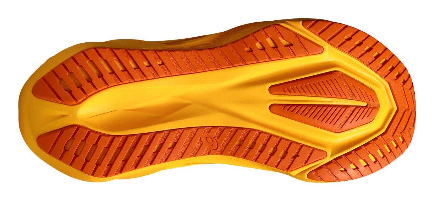 Close up of the ASICS Novablast 5 outsole in the all-orange Yamabuki/Anzu colourway, showing the tread pattern